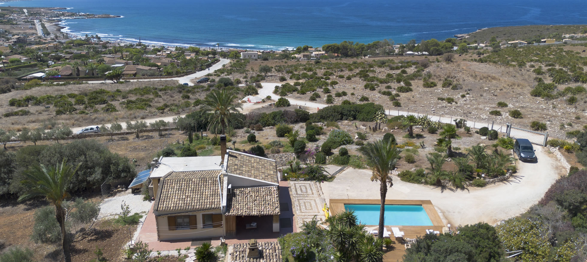 Panoramic photo of the villa with sea view